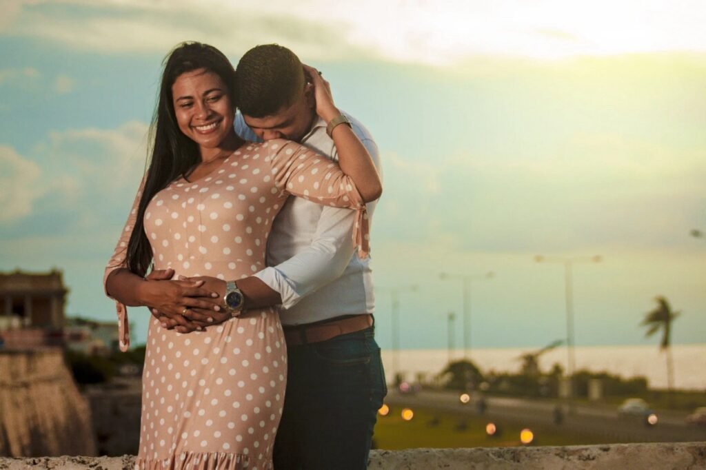 Boy holding waist of girl